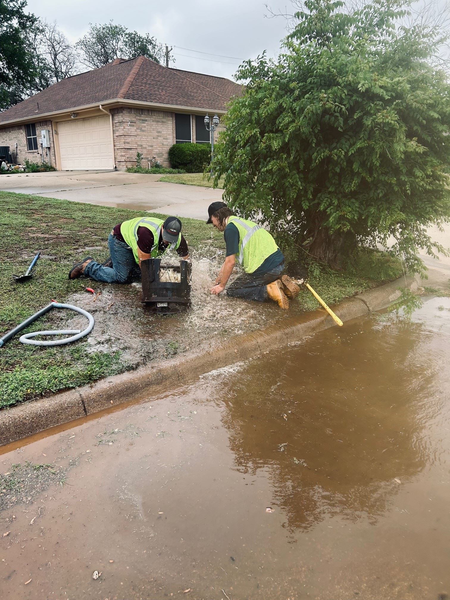 Two Water Distribution workers making repairs.