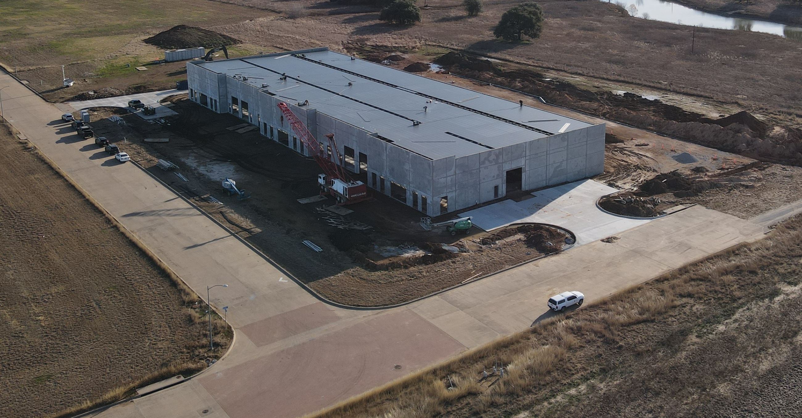 Aerial right view of the Spec Building construction finishing.